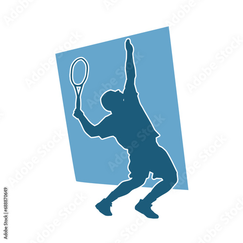 Silhouette of a male tennis player in action pose. Silhouette of a man playing tennis sport with racket.