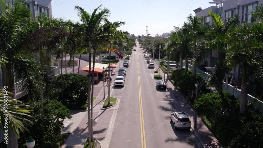 Aerial Forward Shot Of Cars Parked On Road By Residential Buildings In City On Sunny Day - Atlanta, Georgia