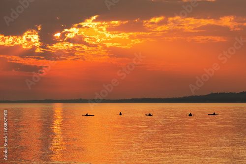 Kayaks at sunset on Lake Huron as viewed from Mackinac Island.