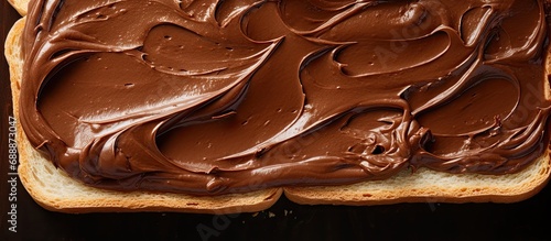 Chocolate spread on wheat bread, from above.