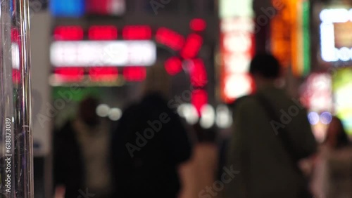 SHINJUKU, TOKYO, JAPAN - NOV 2023 : KABUKICHO downtown area at night. Colorful led neon street signs at entertainment district. Japanese urban nightlife and drinking concept video. Time lapse shot. photo