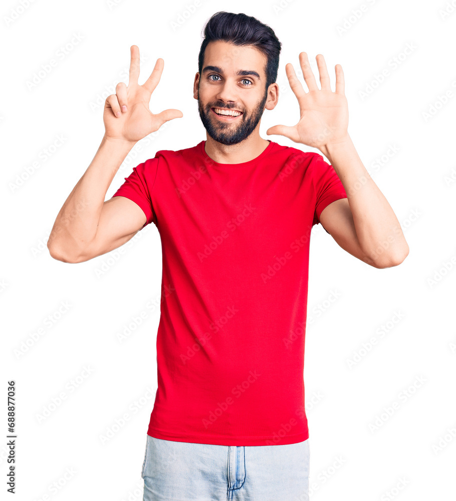 Young handsome man with beard wearing casual t-shirt showing and pointing up with fingers number eight while smiling confident and happy. Young handsome man with beard wearing casual t-shirt showing and pointing up with fingers number eight while smiling confident and happy.