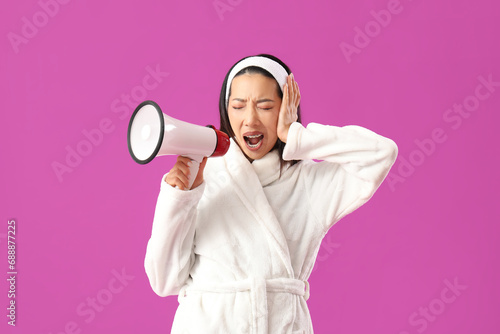 Angry Asian woman in bathro...