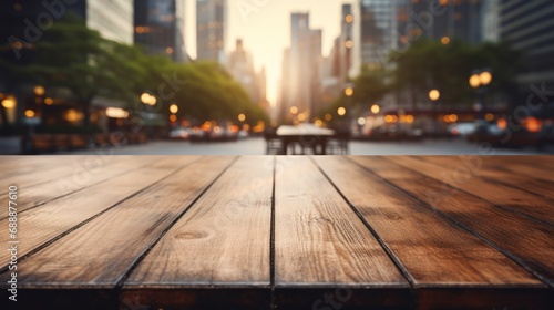 Empty wooden table with blurred street background