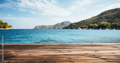 Empty wooden table with blurred sea