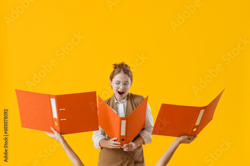Surprised young businesswom...