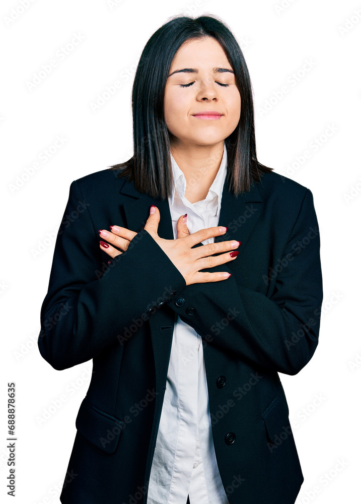 Young brunette woman with blue eyes wearing business jacket smiling with hands on chest, eyes closed with grateful gesture on face. health concept. Young brunette woman with blue eyes wearing business jacket smiling with hands on chest, eyes closed with grateful gesture on face. health concept.