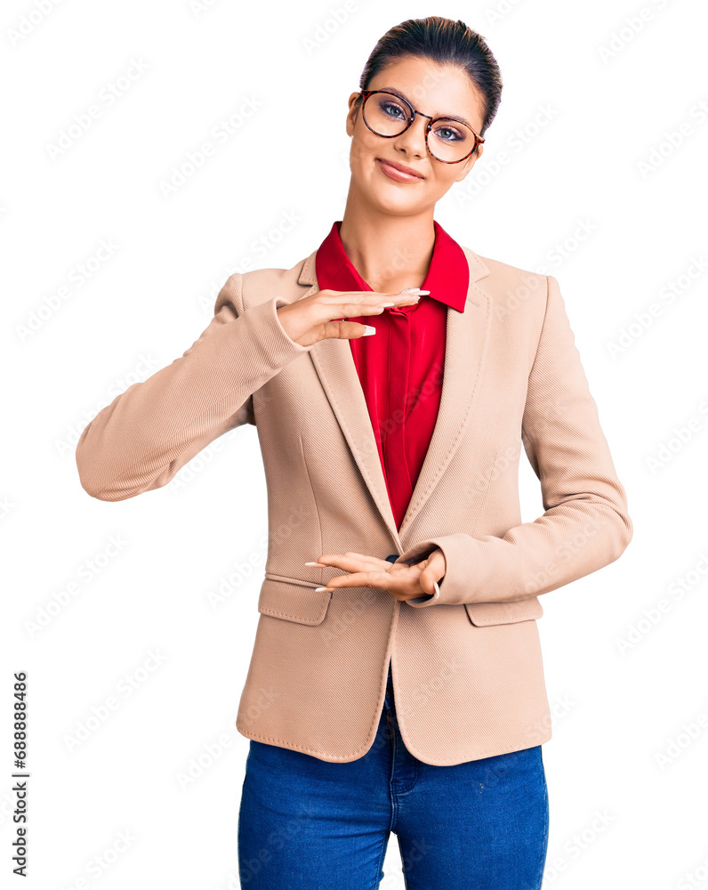 Φωτογραφία Young beautiful woman wearing business shirt and glasses gesturing with hands showing big and large size sign, measure symbol