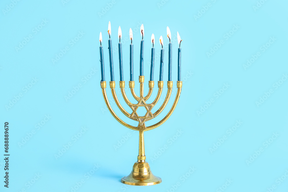 Menorah on blue background. Hanukkah celebration Menorah on blue background. Hanukkah celebration