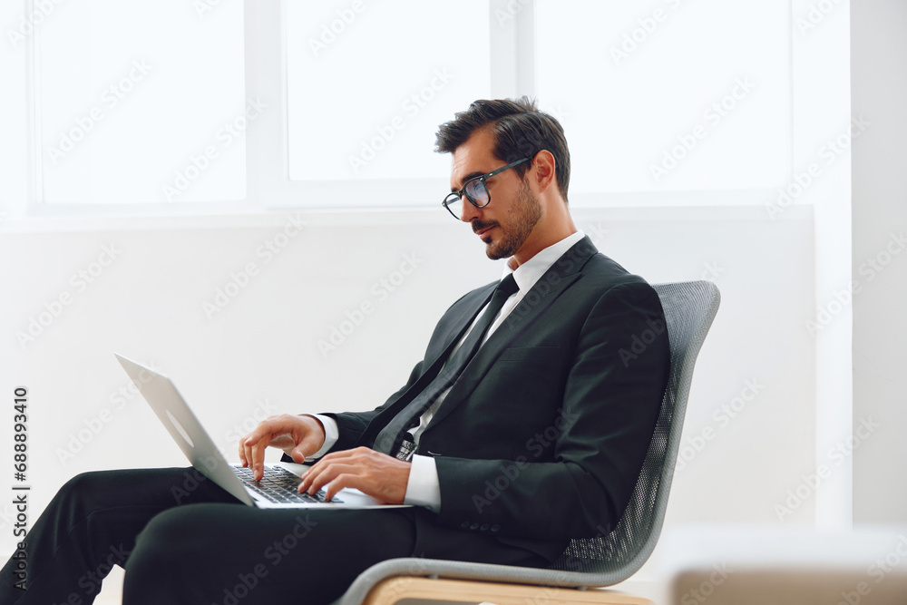 Man business happy job technology lifestyle chair laptop office excited winner businessman suit achievement Man business happy job technology lifestyle chair laptop office excited winner businessman suit achievement