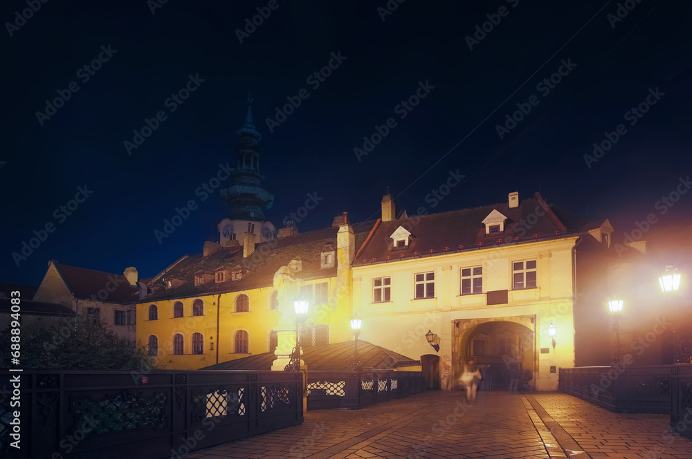 Night view of Michael Gate with a tower in the old town of Bratislava, Slovakia