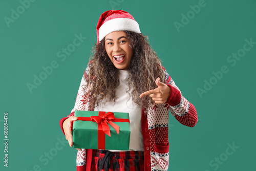 Excited young woman in sant...