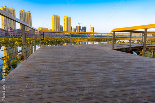 The boardwalk structure of urban park river water