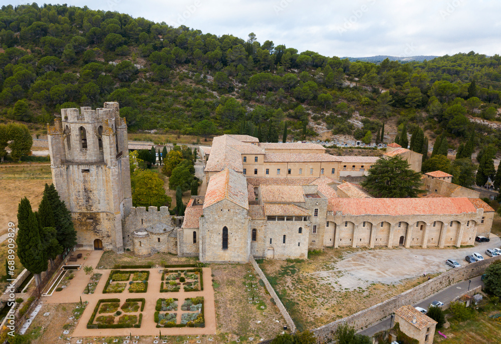 Aerial view of medieval Benedictine monastic complex of Saint Mary in French commune of Lagrasse