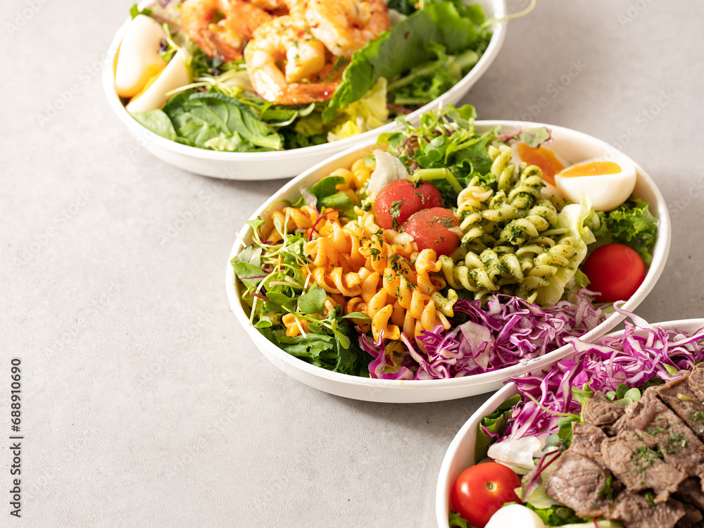 Fusilli salad, several different salads in bowls Fusilli salad, several different salads in bowls