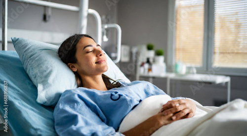 Woman Rests with Closed Eyes in Hospital