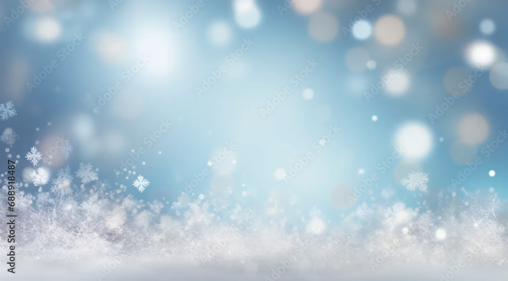 Bokeh background in sky blue and white tones with flying snowflakes.