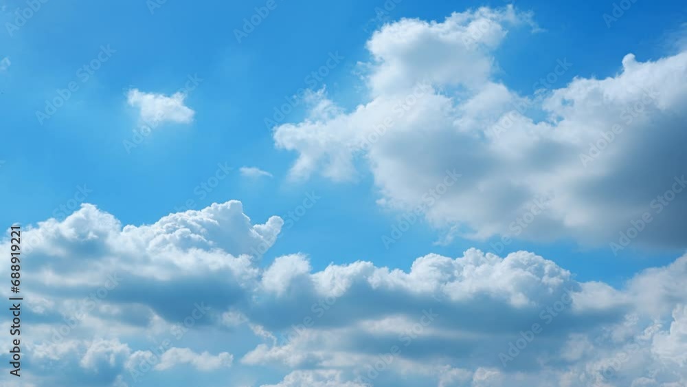 4K : Blue sky timelapse - The world transform in seconds as the sky morphs from clear blue to a canvas of fast-moving clouds, the power and beauty of time-lapse photography. Spring sky background.
4K : Blue sky timelapse - The world transform in seconds as the sky morphs from clear blue to a canvas of fast-moving clouds, the power and beauty of time-lapse photography. Spring sky background.