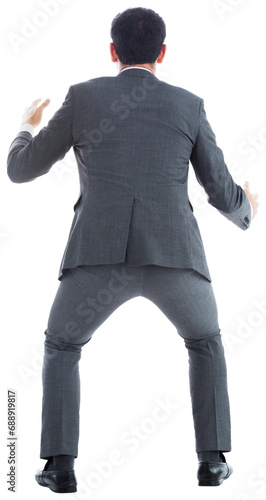 Digital png photo of back view of biracial businessman holding on transparent background