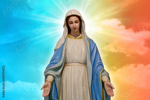 Wallpaper Mural Statue of Our lady of grace virgin Mary with beautiful Sky Pastel with abstract colored background and wallpaper in sweet color. at Thailand. Torontodigital.ca