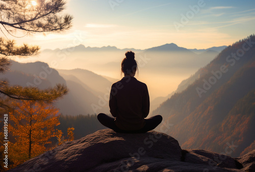 a person meditating on a quiet autumn mountain peak, Ai generated Images