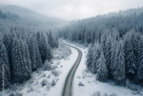 Aerial view of snowy road in the middle of a beautiful forest, AI generated Images