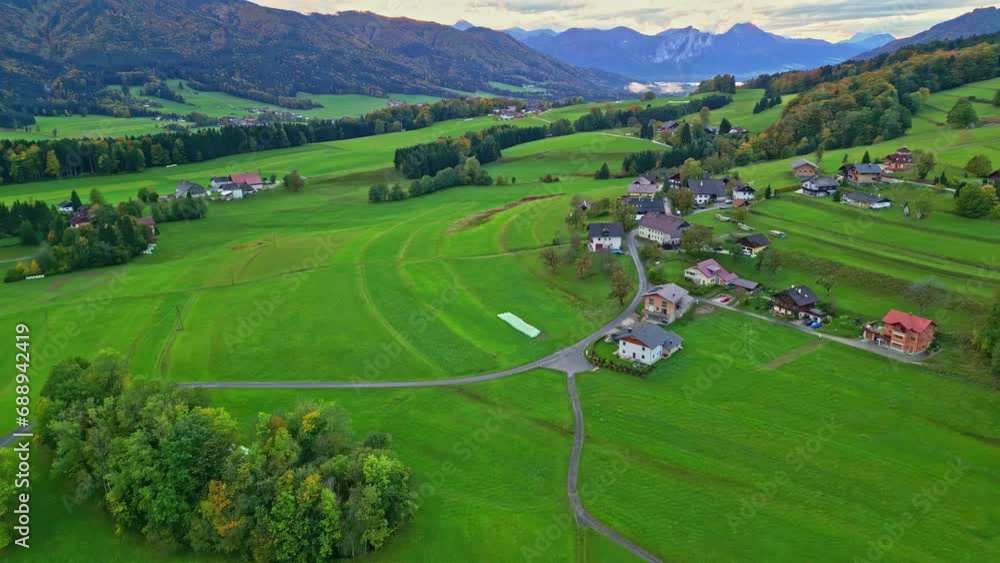 An Aerial Shot Of A Mountainous Landscape And A Small Village In Austria An Aerial Shot Of A Mountainous Landscape And A Small Village In Austria