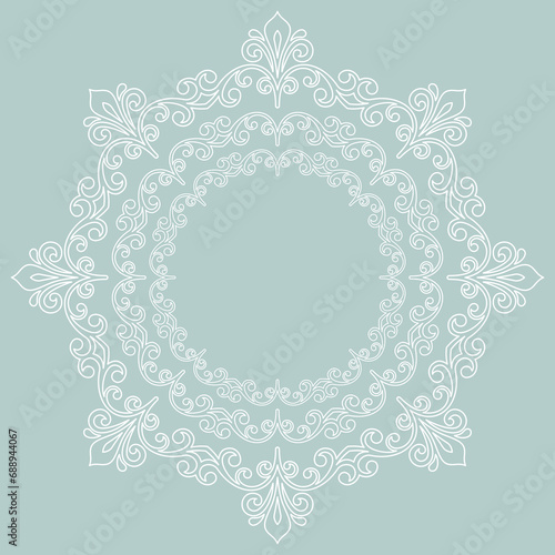Oriental ornament with arabesques and floral elements. Traditional classic ornament. Round light blue and white vintage pattern with arabesques