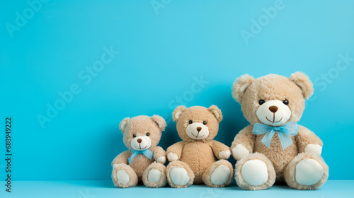 Adorable Teddy Bear on Blue Background © Rosie