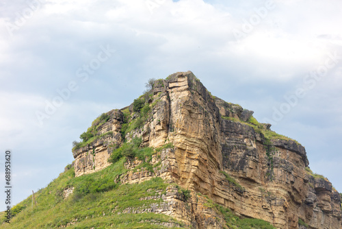 Green mountains in summer against the background of the sky with clouds