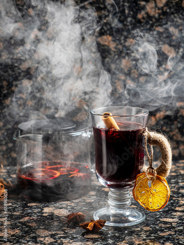 mulled wine on the wooden background
