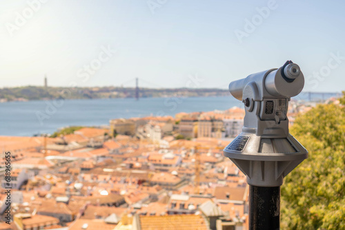 A High-Angle, Daytime View of Lisbon, Portugal: A Telescope Overlooking the Cityscape, Tagus River