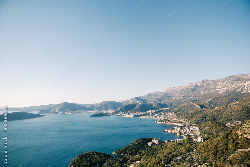 Coast of the Bay of Kotor surrounded by a mountain range. Montenegro