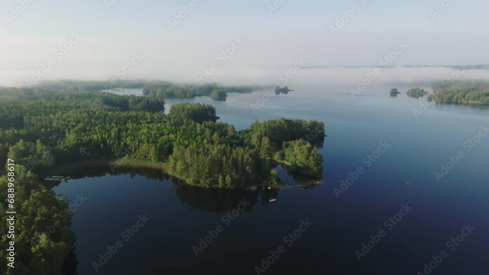 Islet with trees in a beautiful lake Islet with trees in a beautiful lake