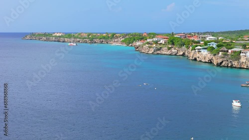 Aerial orbit around Playa kalki and catamaran in distance, Westpunt Curacao photo