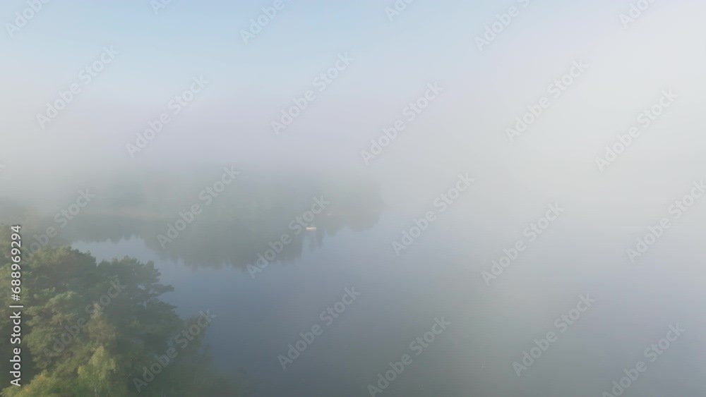 Reflection over the water on a lake with sun and blue sky Reflection over the water on a lake with sun and blue sky