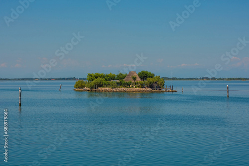 A traditional casone fisherman's hut on an island in the Grado section of the Marano and Grado Lagoon in Friuli-Venezia Giulia, north east Italy. August.