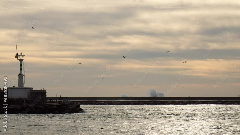 Big waves are hitting and splashing over the jetty in Istanbul in slow motion. Big waves are hitting and splashing over the jetty in Istanbul in slow motion.