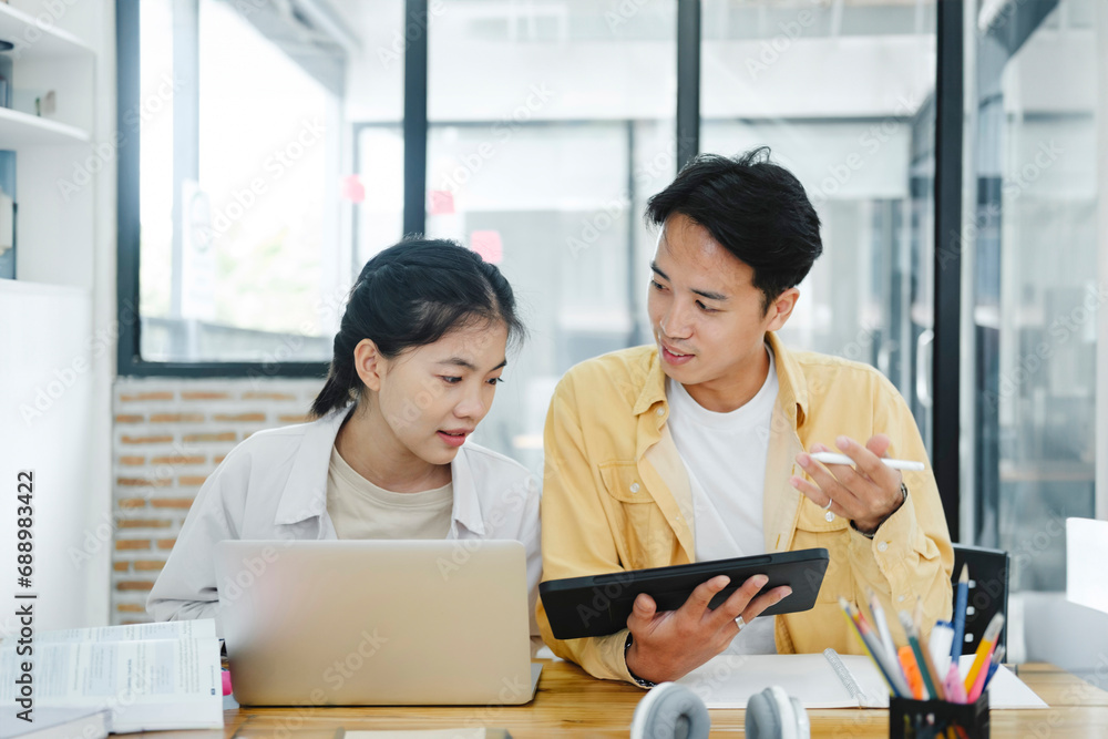 Young students campus helps friend catching up and learning. Young students campus helps friend catching up and learning.