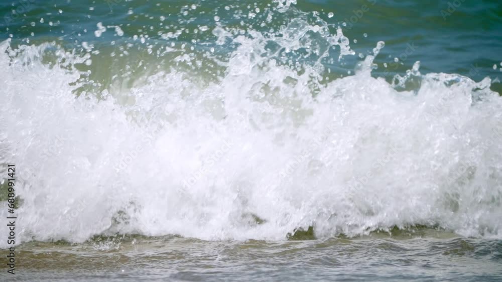 Swells of foamy waves, surging and splashing by the seaside of Pattaya Beach in Chonburi province in Thailand. Swells of foamy waves, surging and splashing by the seaside of Pattaya Beach in Chonburi province in Thailand.