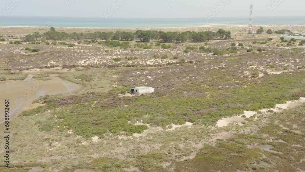 Drone orbit shot of beachside of Armona Culatra in Faro Island, Portugal Drone orbit shot of beachside of Armona Culatra in Faro Island, Portugal