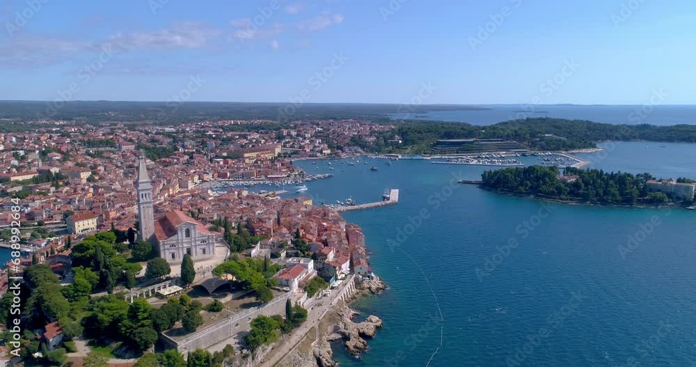 Rovinj, Croatia aerial wide shot over sea looking south over entire town Rovinj, Croatia aerial wide shot over sea looking south over entire town