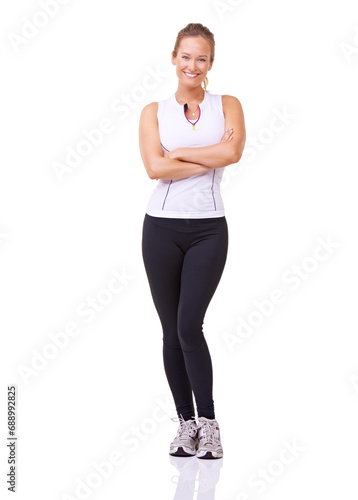 Portrait, woman and arms crossed for fitness, studio and happy with exercise wellness in gym clothes. Model, usa and smile face with commitment to health body, training and relax by white background