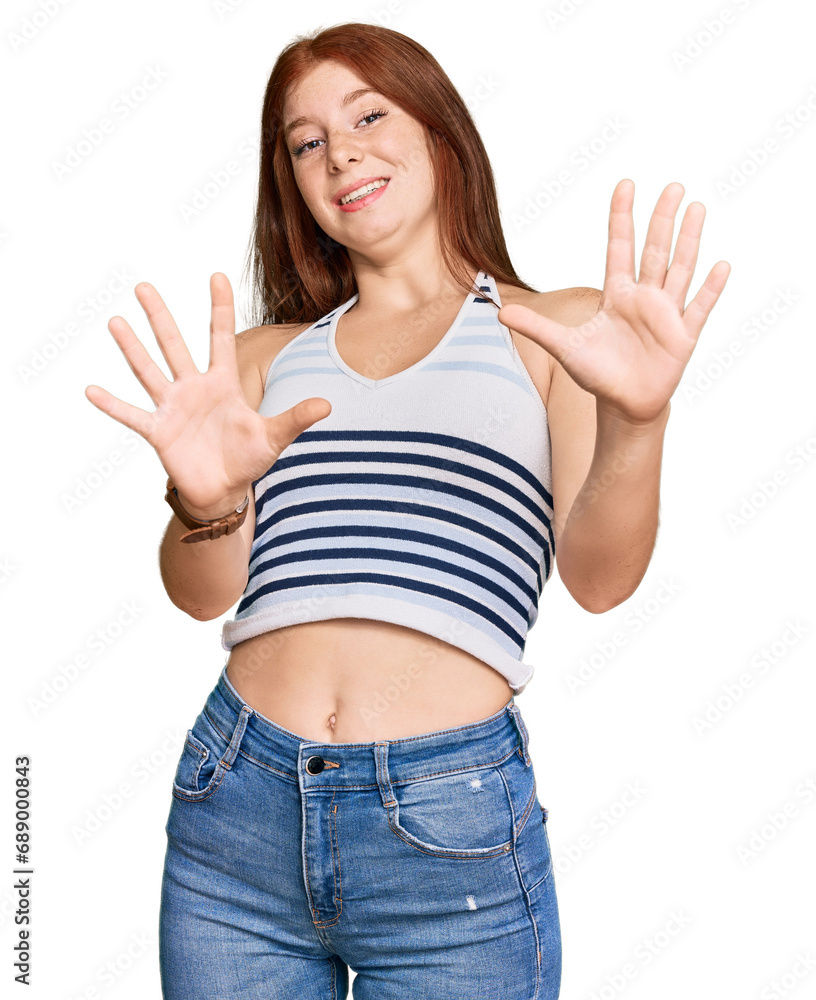 Young read head woman wearing casual clothes afraid and terrified with fear expression stop gesture with hands, shouting in shock. panic concept. Young read head woman wearing casual clothes afraid and terrified with fear expression stop gesture with hands, shouting in shock. panic concept.