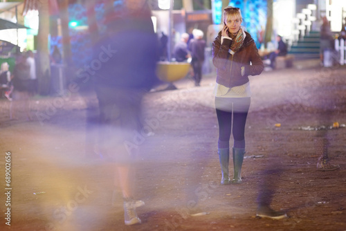 Phone call, blur and woman in city at night, communication or listening to conversation. Smartphone, chat and person outdoor in urban street, connection or speaking to contact on digital mobile tech