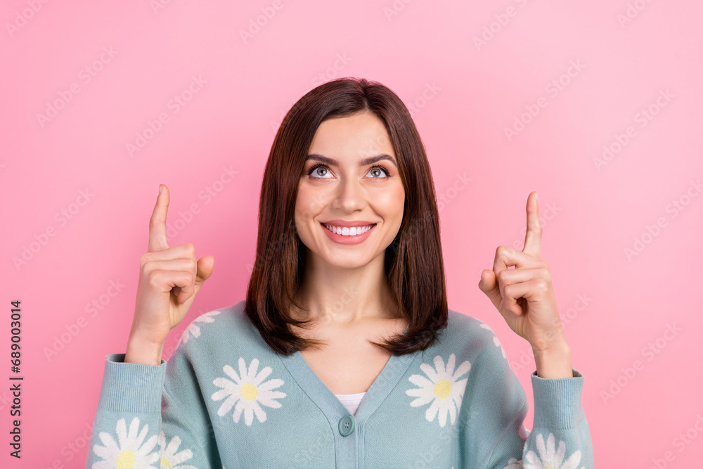 Portrait of charming business lady look up direct fingers above head novelty poster wear cardigan isolated pink color background Portrait of charming business lady look up direct fingers above head novelty poster wear cardigan isolated pink color background