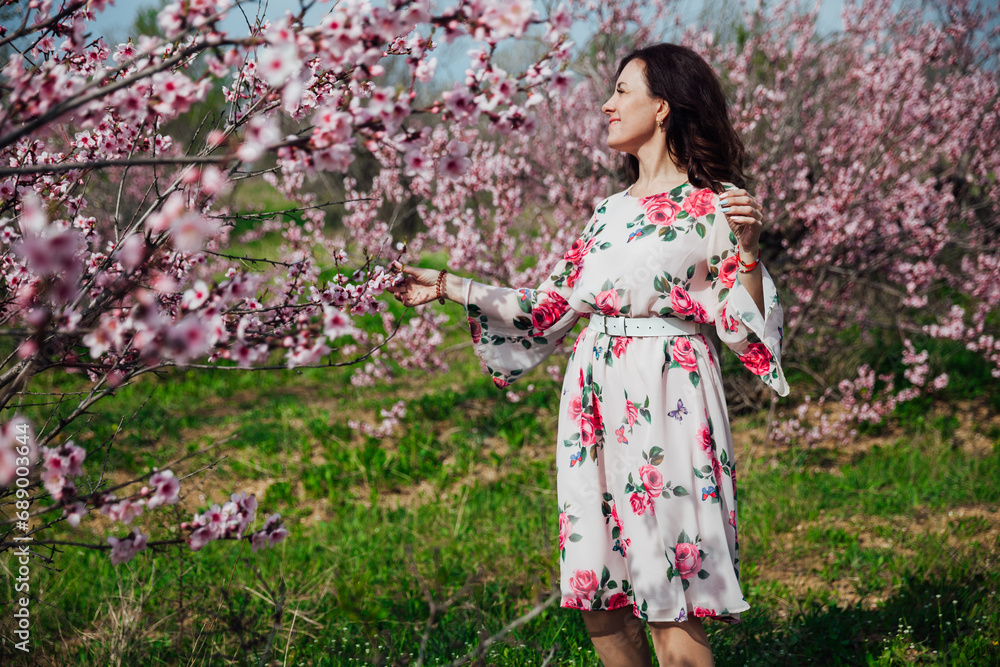 beautiful woman brunette in flowering trees spring nature travel walk beautiful woman brunette in flowering trees spring nature travel walk