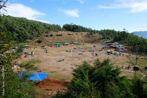 View of campsite with tents at the base of Mount Ramelau in the remote districts of Timor-Leste in Southeast Asia photo