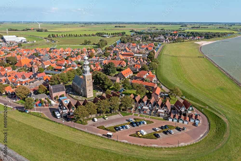 Aerial from the historical city Hindeloopen at the IJsselmeer in the Netherlands Aerial from the historical city Hindeloopen at the IJsselmeer in the Netherlands