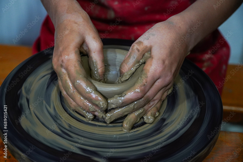 Pottery. The oldest trade from Daco-Roman times. Hands dirty with clay. Ceramics. Modeling in clay. Color and black-and-white detail photos. Pottery. The oldest trade from Daco-Roman times. Hands dirty with clay. Ceramics. Modeling in clay. Color and black-and-white detail photos.